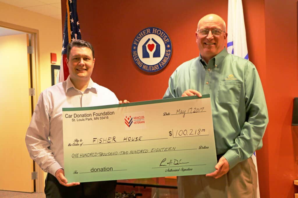 big check photo from Vehicles For Veterans to Fisher House