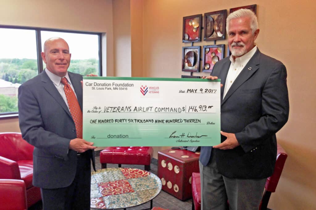 Giant VFV check presented to Veterans Airlift Command for $146,000. 