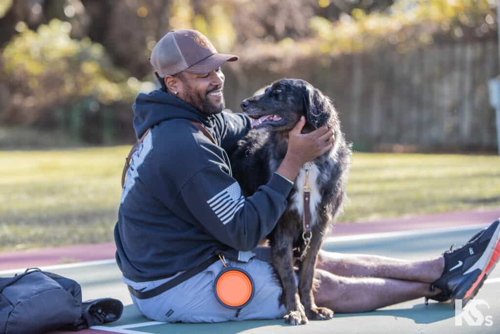 veteran outside with his dog