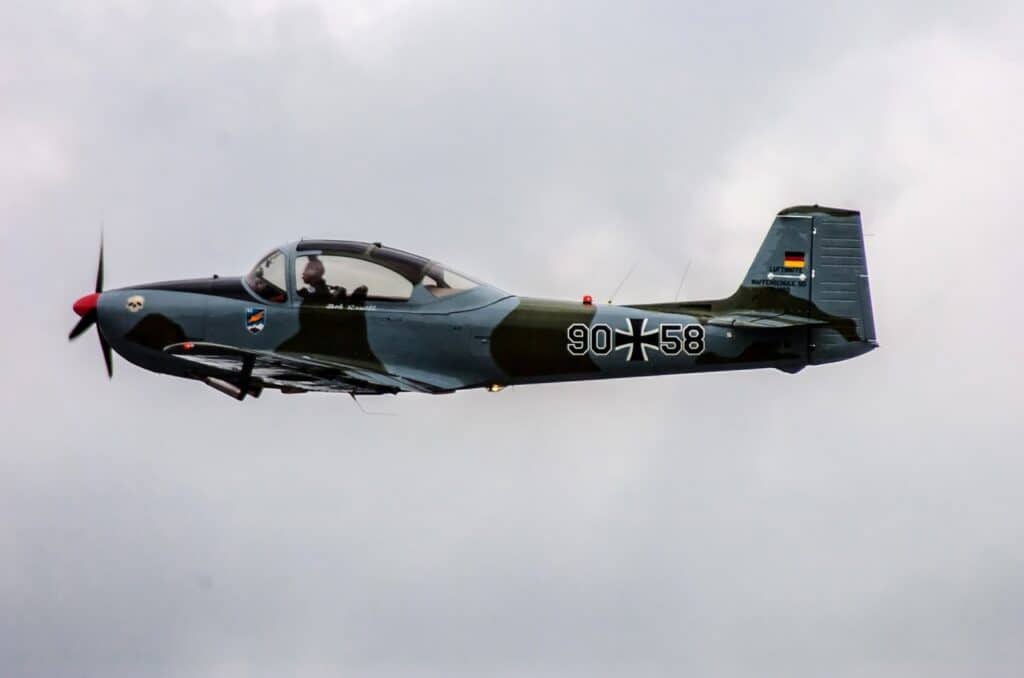 Classic military airplane in the skies over Winston-Salem, NC