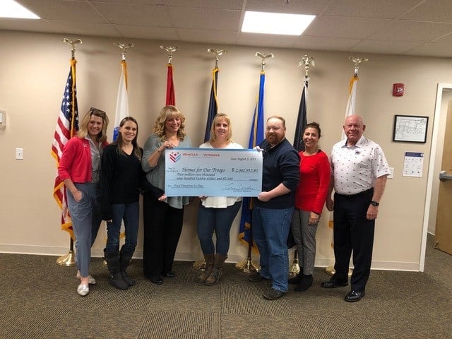 Big check for over $2 million to Homes for Our Troops from Vehicles For Veterans.