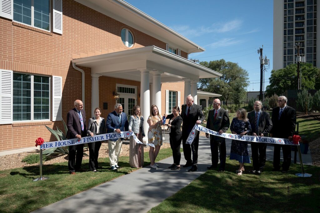 Fisher house veterans charity doing a ribbon cutting
